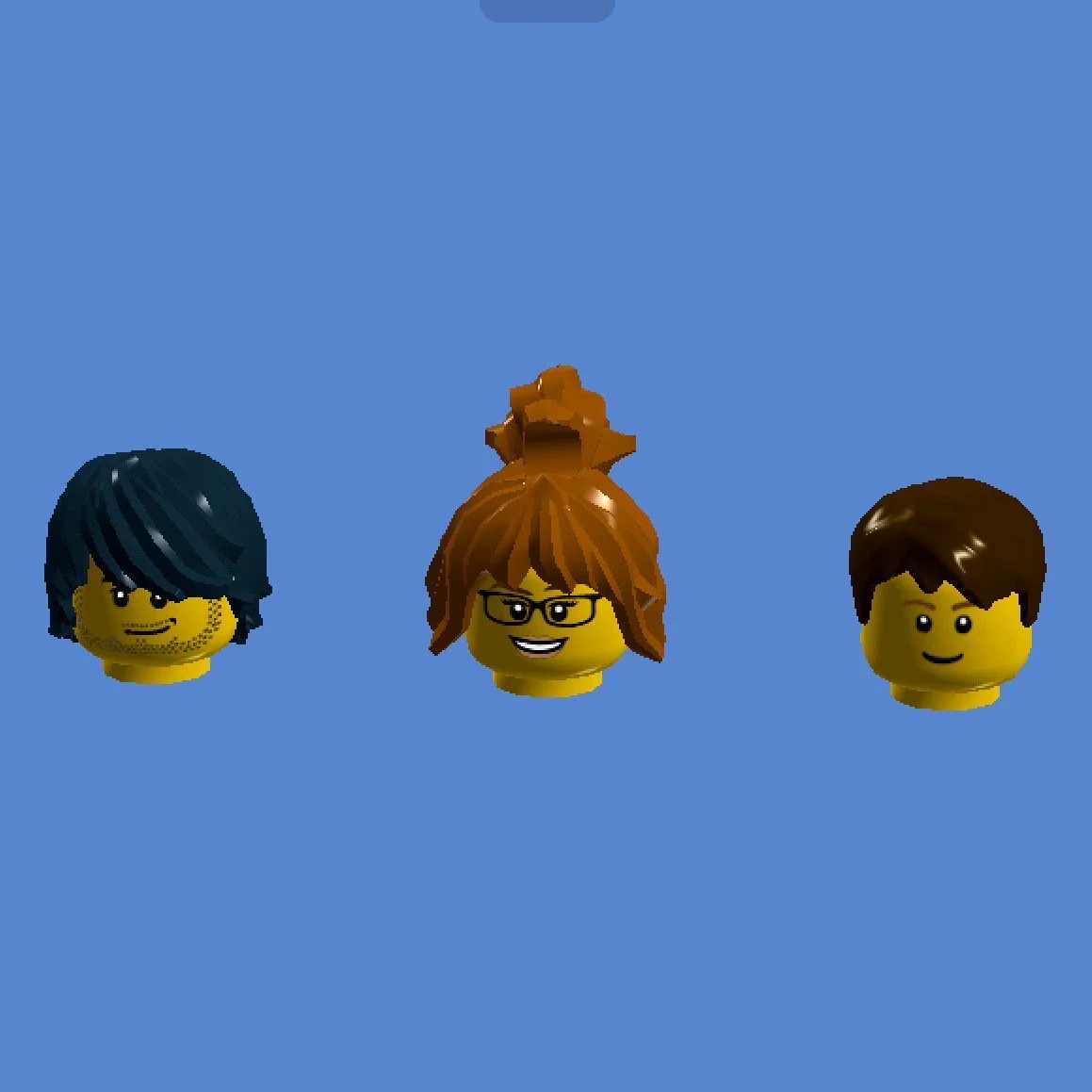 Three custom LEGO minifigure head designs on a blue background
